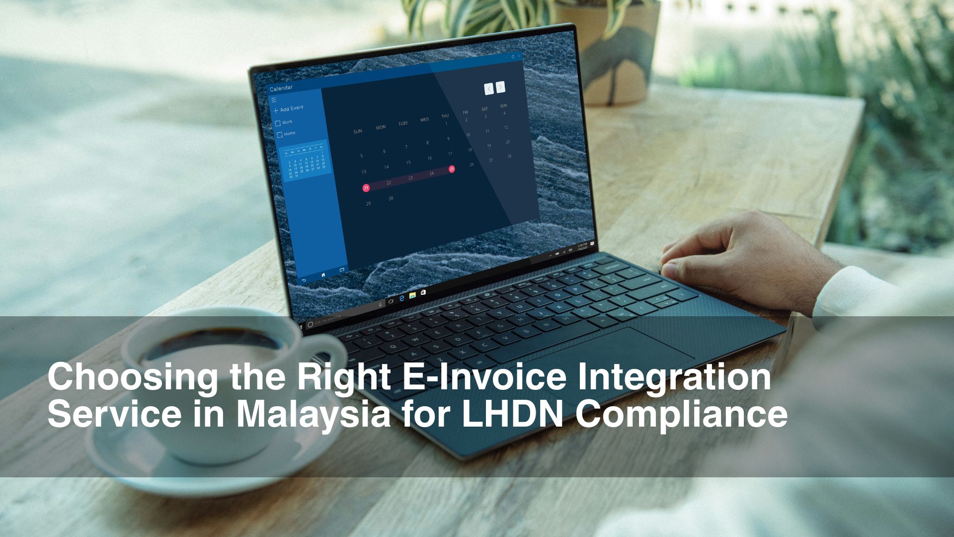 Man types on laptop einvoicing table